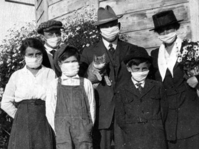 family photo of six people plus cat from the 1918 flu pandemic