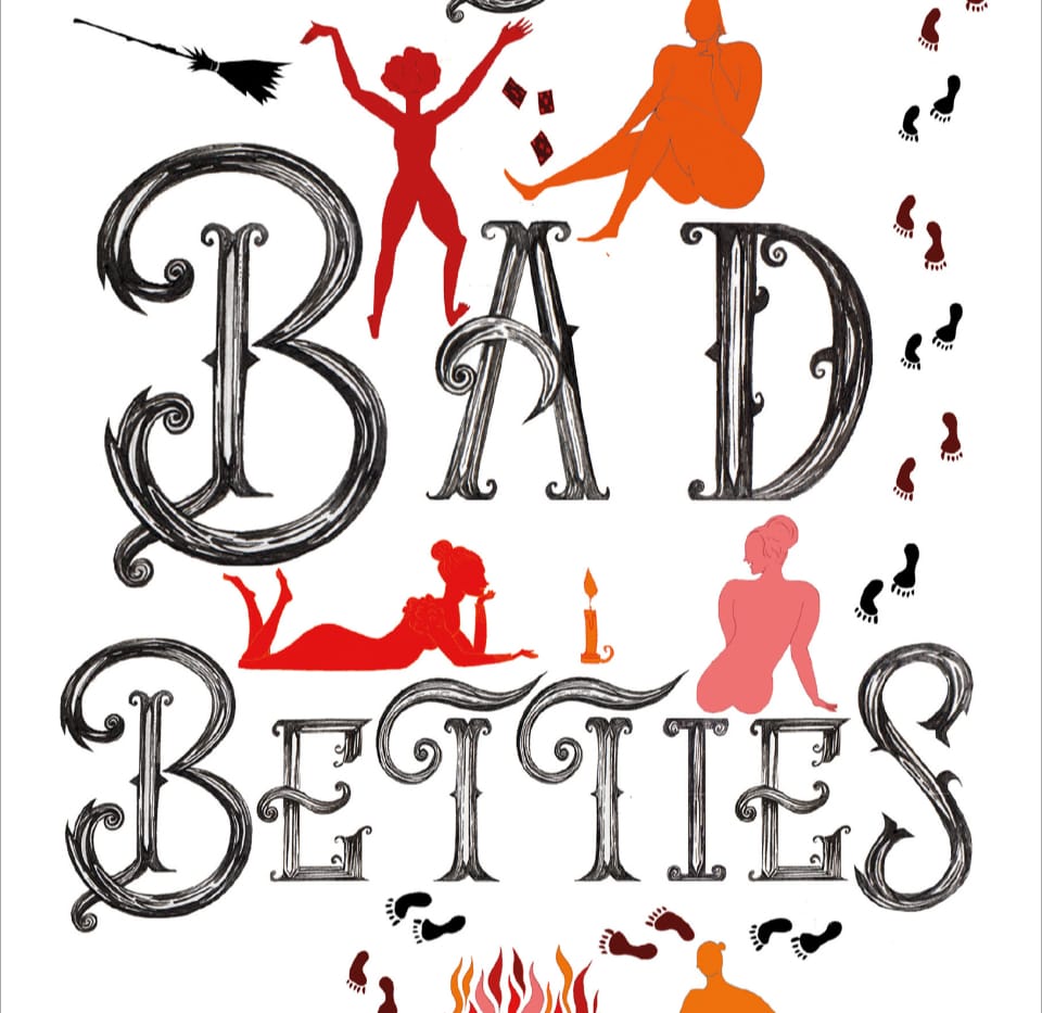 Bad Betties written in black curly script on a white background there are some footprints and nude female silhouettes a candle and a broomstick.