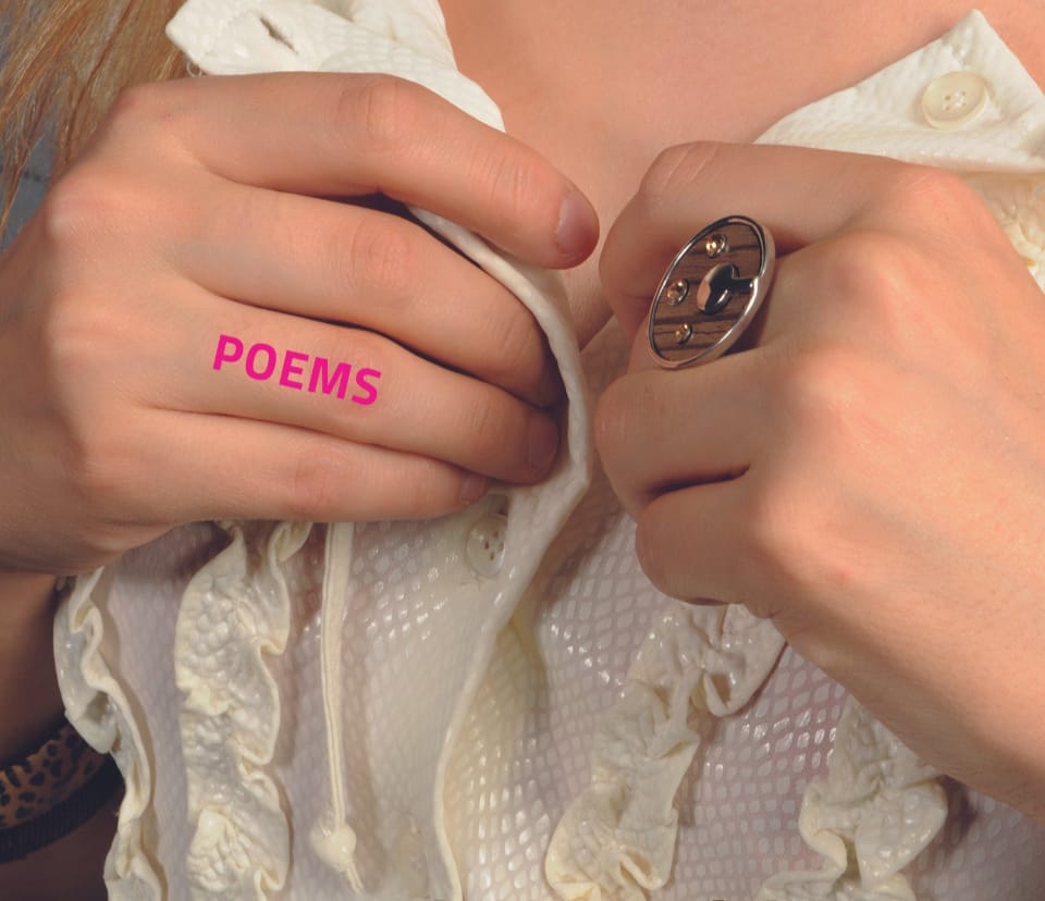 A woman's chest, her hands are beginning to unbutton her white top.