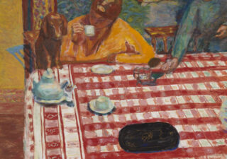Painting showing a woman sitting at a table with a red and white check tablecloth, she is drinking coffee and a small brown dachshund has its paws on the table next to her.