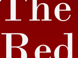 Portion of a book cover. It has a dark red background with parts of the words The and Red shown.