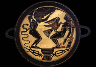 What looks like an ancient Greek plate or bowl. A bloke with a bad back seems to be have been bitten by a snake and he is gesticulating towards a reclining fellow who is possibly having his heart pecked out by a large bird of prey. Lotta blood, but they were rough in them days.