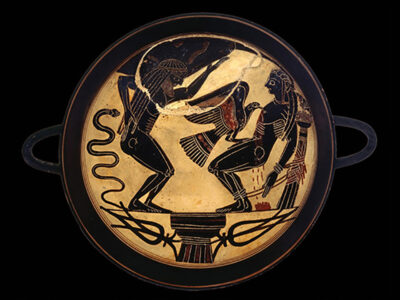 What looks like an ancient Greek plate or bowl. A bloke with a bad back seems to be have been bitten by a snake and he is gesticulating towards a reclining fellow who is possibly having his heart pecked out by a large bird of prey. Lotta blood, but they were rough in them days.