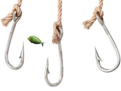 Three large fishhooks dangling on what looks like hemp rope, a small green (jade?) fish swims between them.