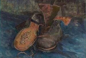 Section from a painting showing pair of well worn leather boots, hobnails on the soles.