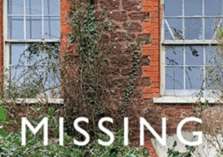 The word 'MISSING' in white block capitals superimposed on a photo of the back of a red brick house, two sash windows, overgrown with foliage from the garden.